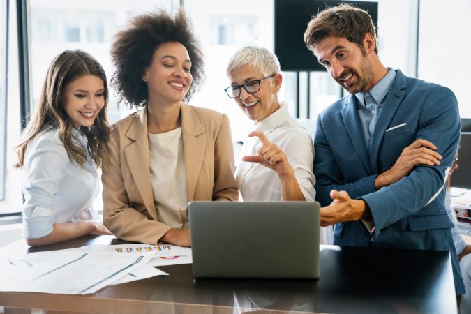 portrait-of-successful-business-team-working-in-office.jpg portrait-of-successful-business-team-working-in-office.jpg